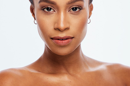 Woman, face and beauty skincare for makeup, cosmetics or facial treatment isolated on a white background. Portrait of beautiful female in satisfaction with cosmetic lips for self love or perfect skin, a Photo by Peopleimages.com
