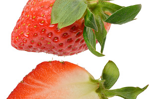 A whole large strawberry and its longitudinal section showing ju, a Food & Drink Photo by ndanko