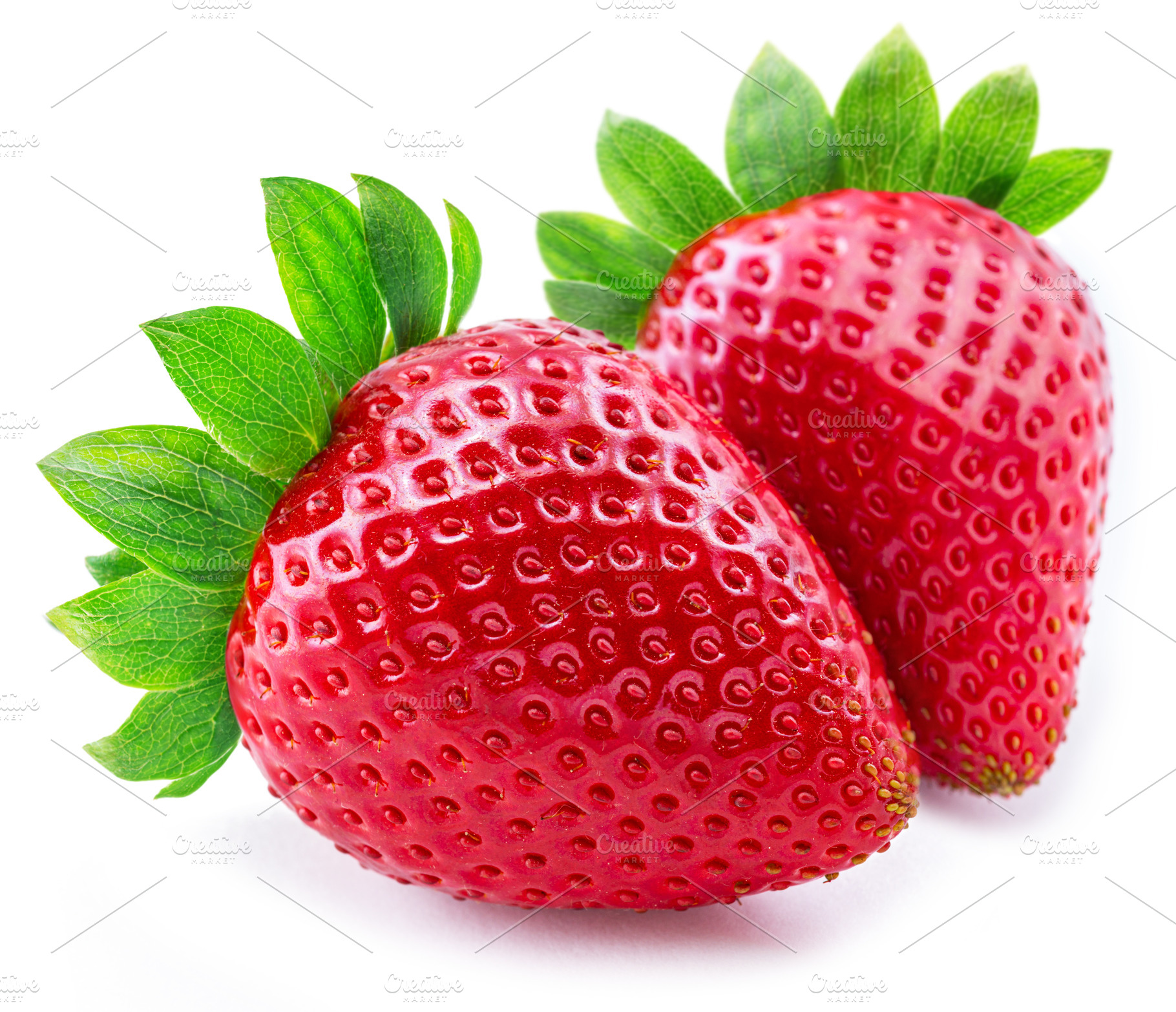 Two ripe strawberries isolated on white background., a Food & Drink Photo by Volff