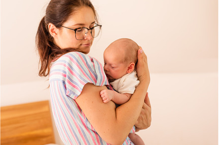Young tired mother holding her, a Person Photo by oksix