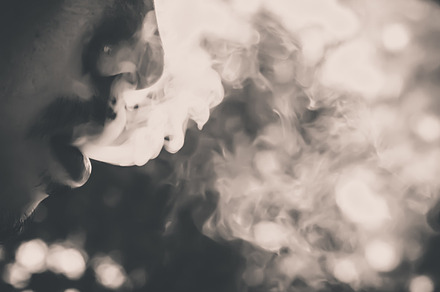 Man smoking stock photo containing smoke and weed