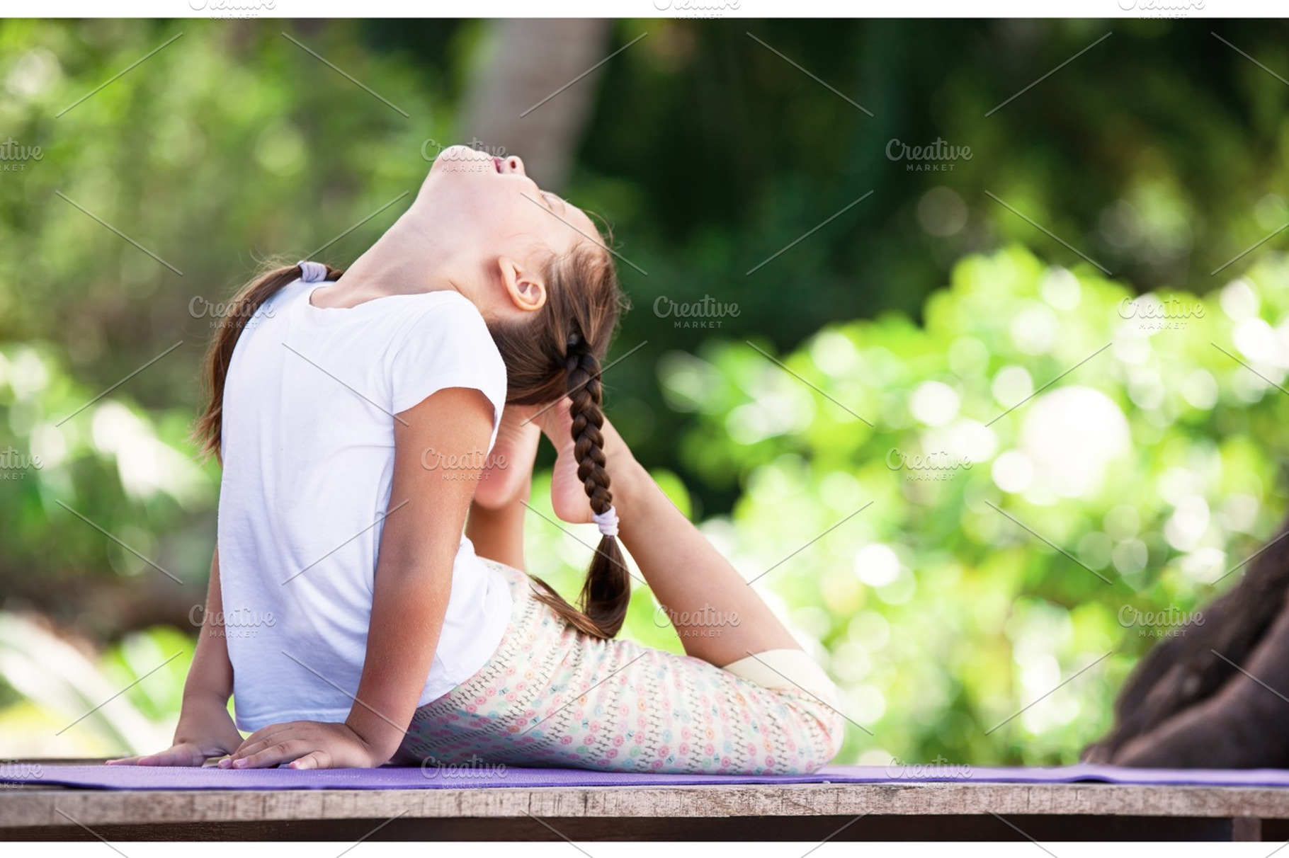 Child doing exercise on platform outdoors healthy lifestyle yoga girl stock, a Person Photo by Jyliana's shop