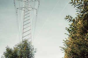 Power line over rural road, a Technology Photo by SkyNext
