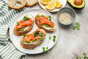 Bruschetta with salmon, avocado, and cream cheese, a Food & Drink Photo by Olena Rudo