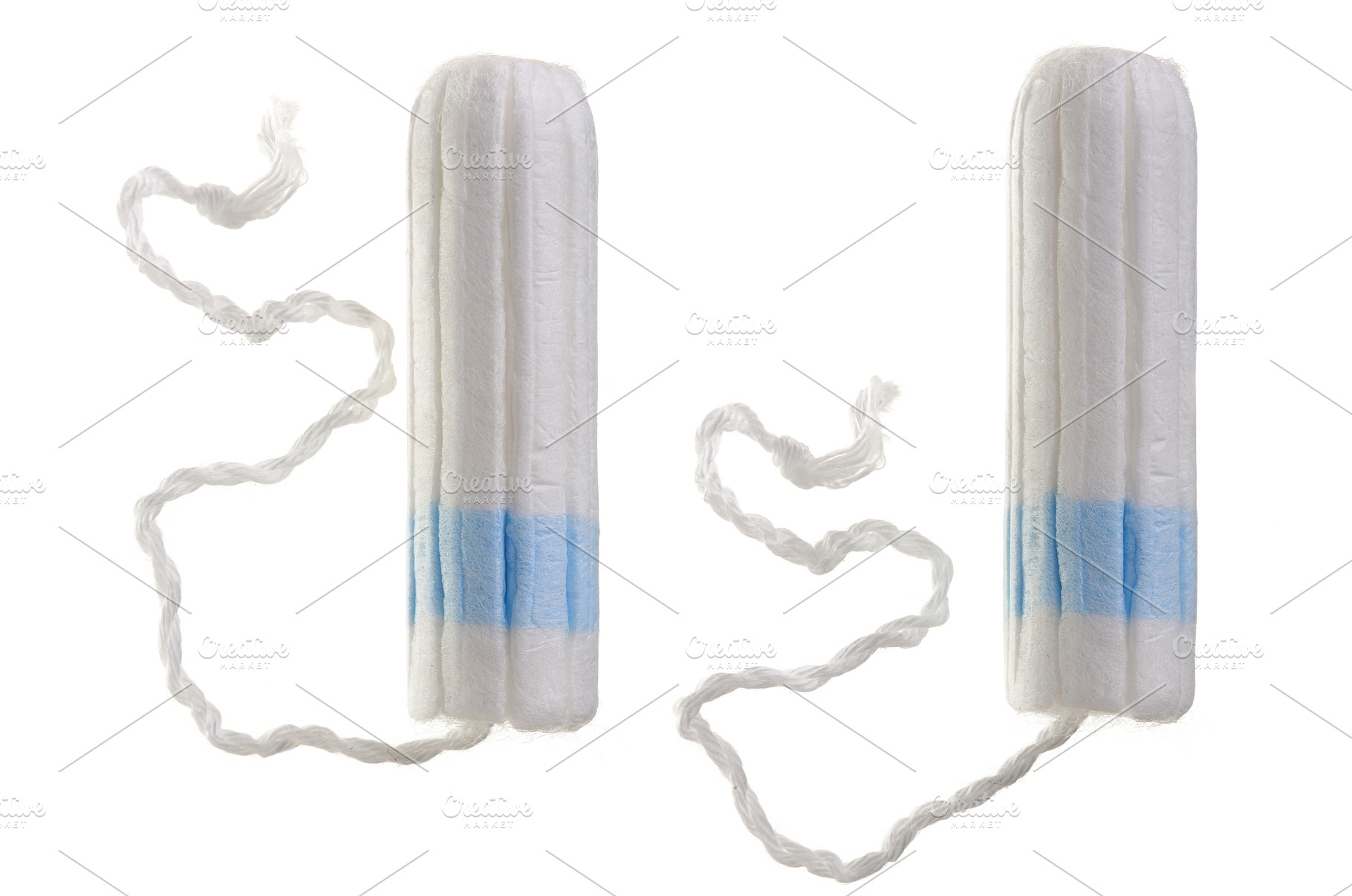 A new tampon with blue string to, a Health & Medical Photo by NataPhoto