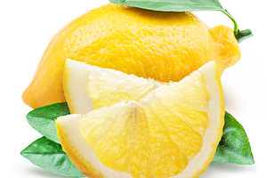 Ripe lemon fruits and lemon slices isolated on white background., a Food & Drink Photo by Volff