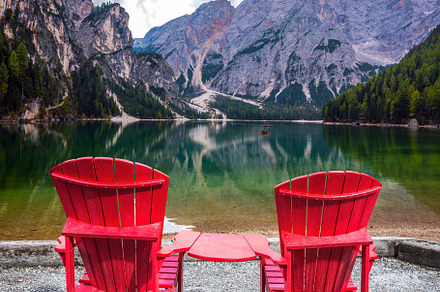 Two comfortable red deck chairs