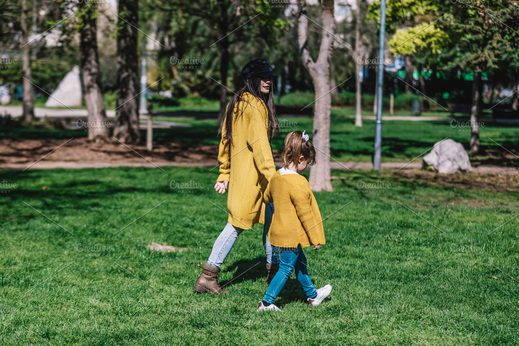 Mother with her baby. Mom and daughter in an autumn park, a Person Photo by 2Design