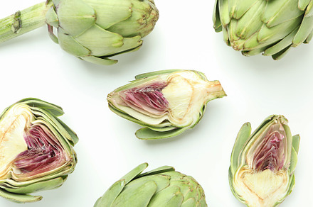 Concept of healthy food with artichoke on white background, a Food & Drink Photo by AtlasStudio PRO