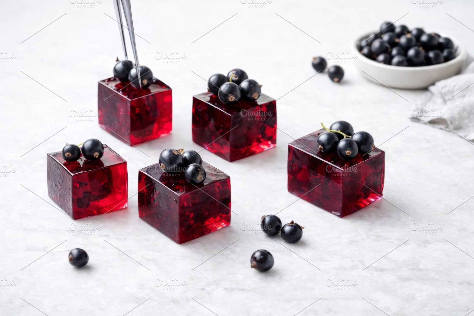 Blackcurrant jelly cubes garnished w, a Photo by Dvoevnore photos