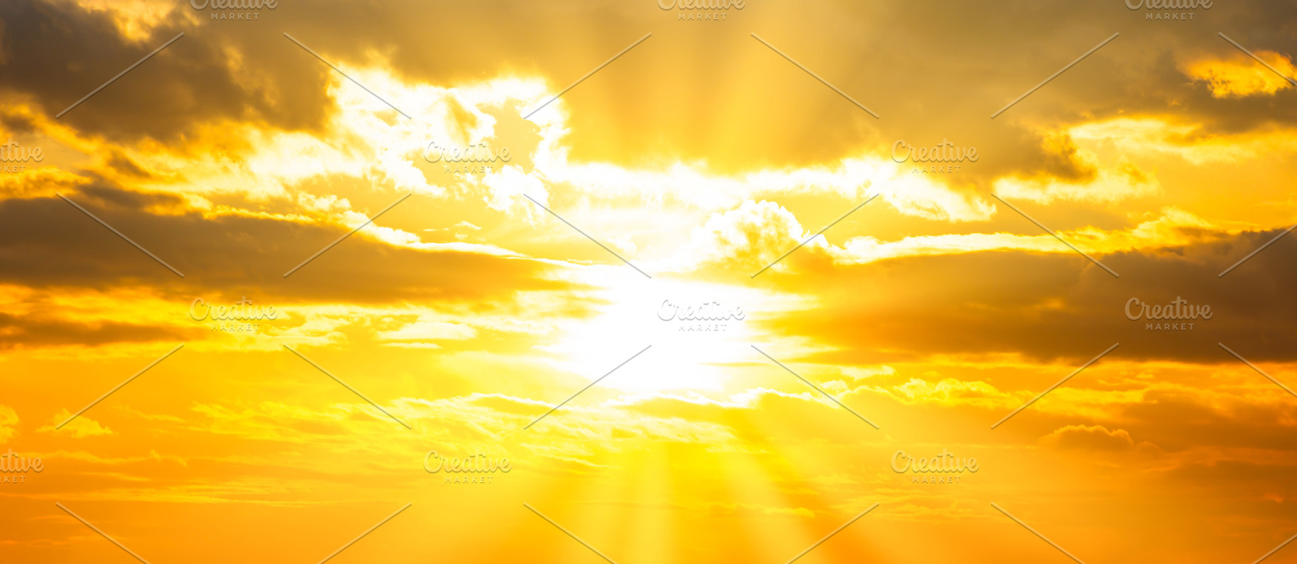 Sunset sky with sunset clouds and sun rays, a Nature Photo by Vapi