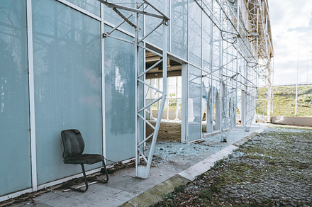 Abandoned glass building with ruins, an Architecture Photo by SkyNext
