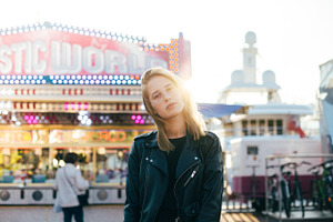 Model at carnival festival fair featuring girl, woman, and person