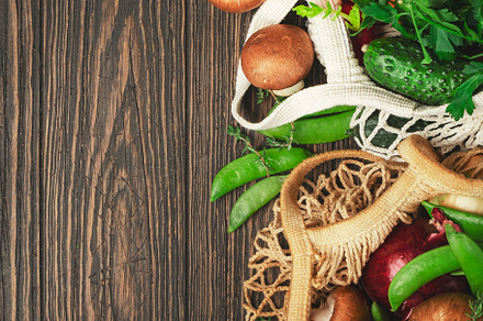 Reusable shopping textile bags full of organic spring vegetables, a Food & Drink Photo by 5PH