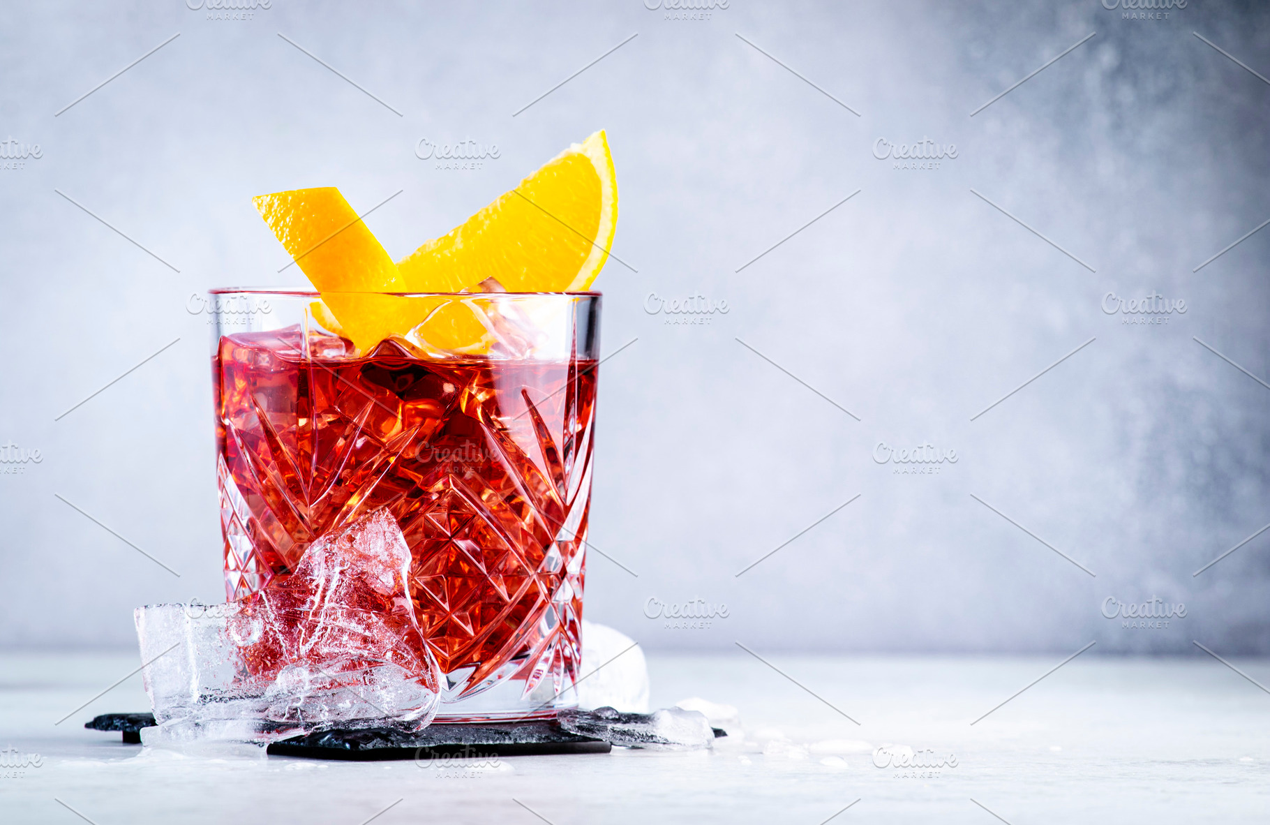 Negroni alcoholic cocktail drink with dry gin, red vermouth and, a Food & Drink Photo by 5PH