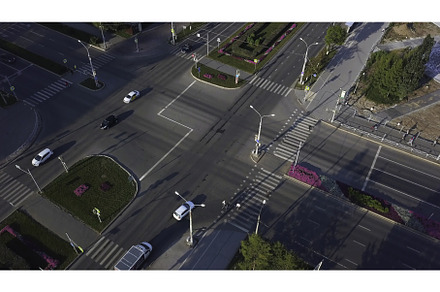 Top view of city intersection on, a Transportation Photo by Media Whale Stock