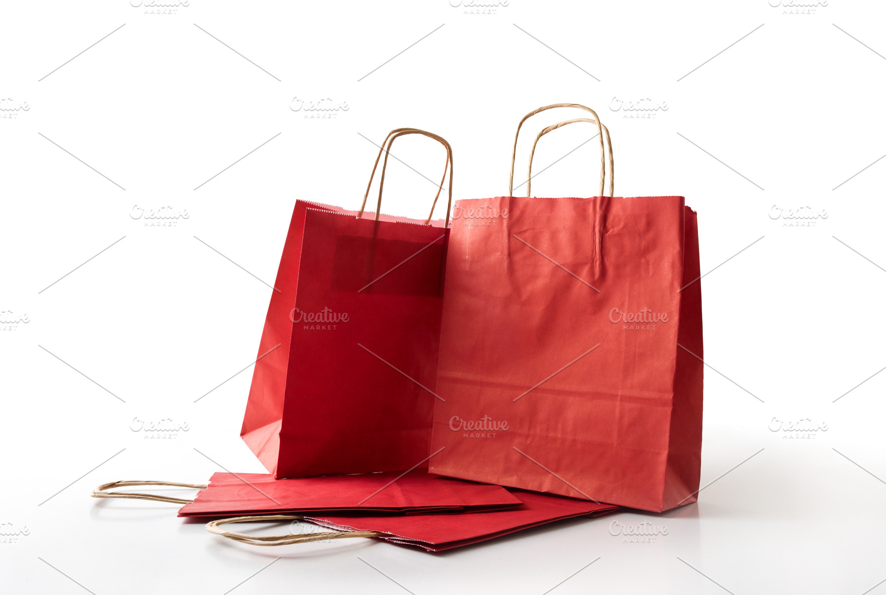 Pack of empty red paper shopping bag cut out, a Holiday Photo by Davizro's Market
