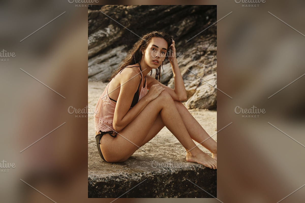 Seated on Beach Rocks, Warm Tones, a Beauty & Fashion Photo by Chris Joel Campbell (Photo 1 of 2)