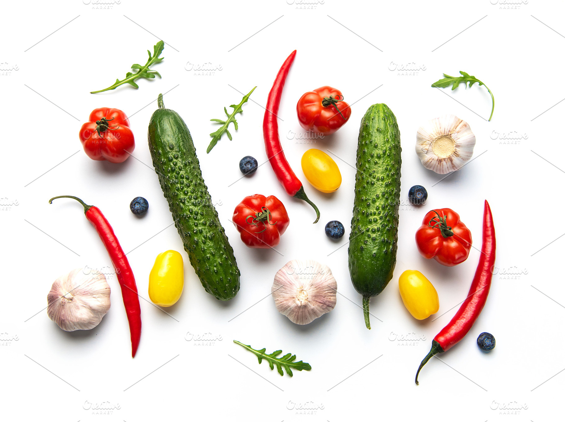 Colorful fresh vegetables and berries on white background, a Food & Drink Photo by Olena Rudo