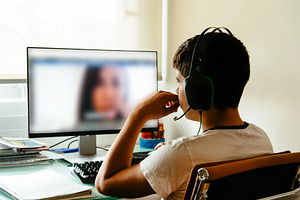 Teenager is studying at home stock photo containing male and pc