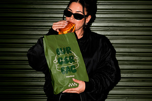Woman with Delivery Bag Mockup, a Packaging Mockup by The Rose Project