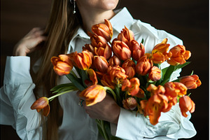 Woman holding vibrant bouquet of, a Nature Photo by wip3out