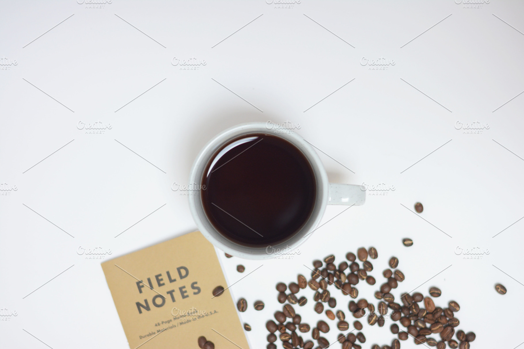 Coffee Beans & Notebook, a Food & Drink Photo by Stitch & Shutter Stock