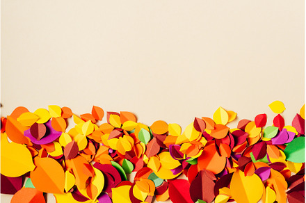 Vibrant paper autumn leaves on, an Arts & Entertainment Photo by Yummypic