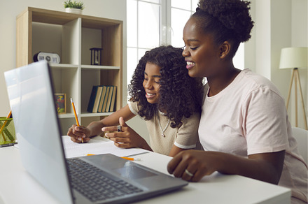 Happy young African American mother