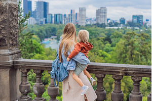 Mother with her young son near, an Architecture Photo by Elizaveta Galitskaya