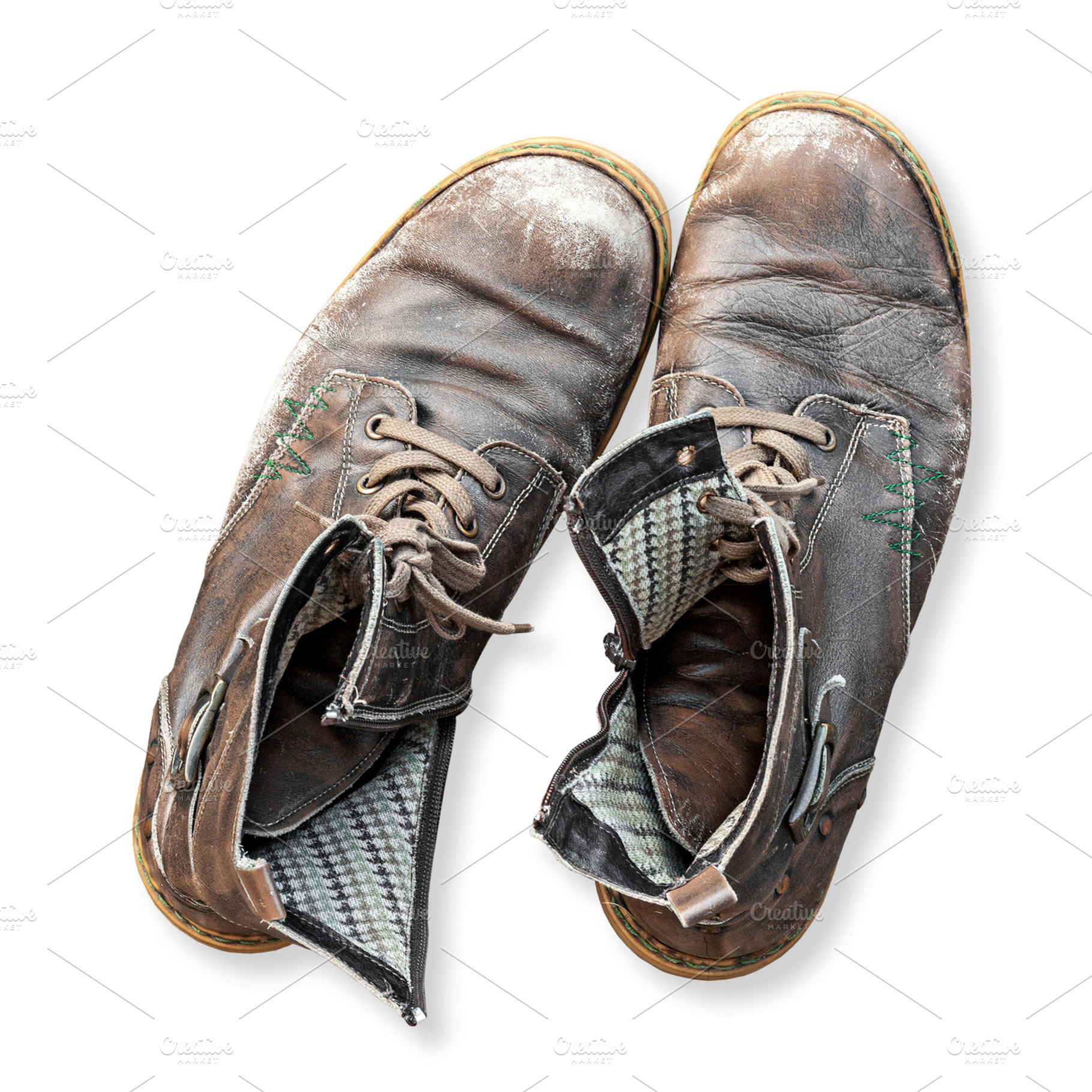 Pair of old boots isolated, a Beauty & Fashion Photo by BOOCYS