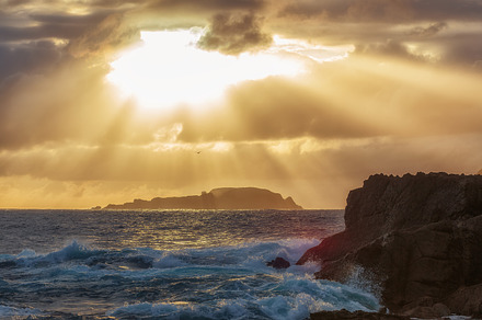 Sun rays through the clouds, a Nature Photo by PhotoNature