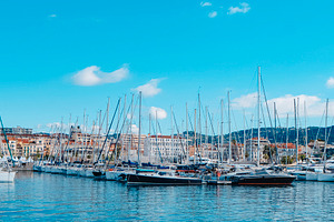 panoramic view of Cannes Vieux Port from the sea, a Photo by Nito