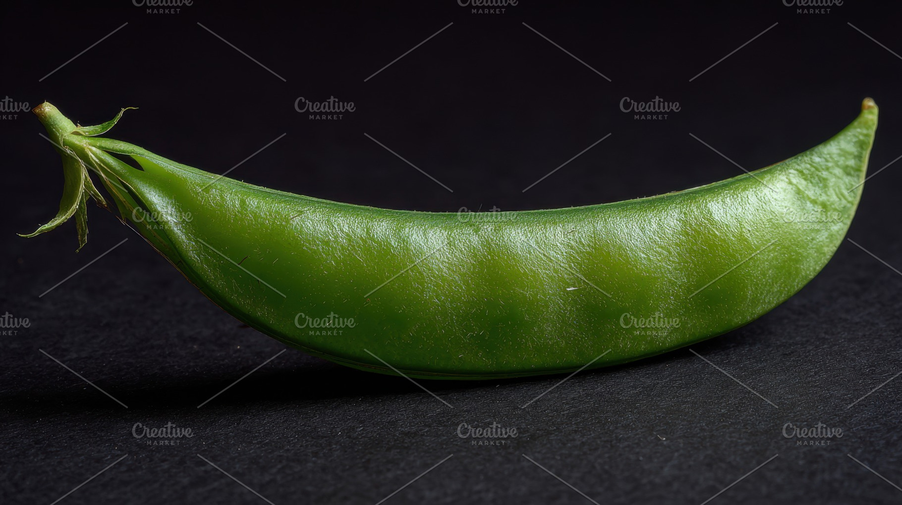 Green pea pod on dark surface, a Photo by Beautiful things