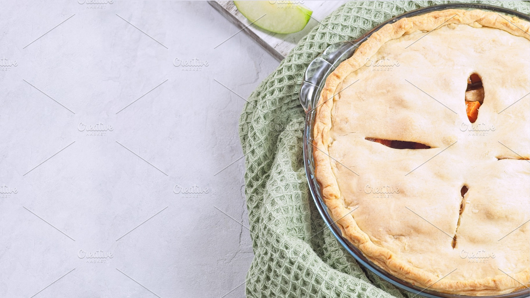 Sweet potato and apple cobbler in glass baking dish, horizontal top view copy s, a Food & Drink Photo by iuliia_n