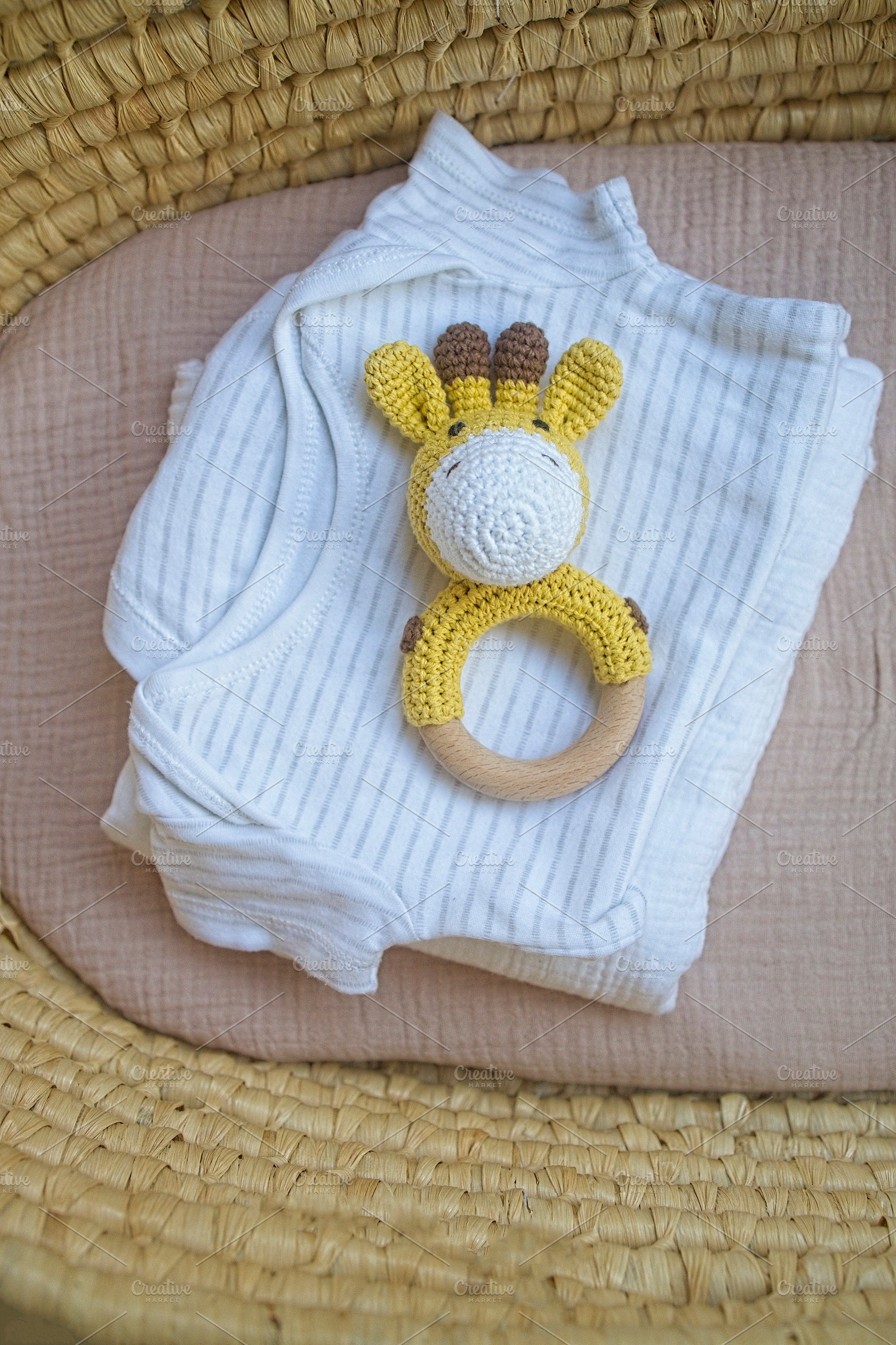 basket there are things for the baby and wooden and knitted toys, a Beauty & Fashion Photo by TanaCh