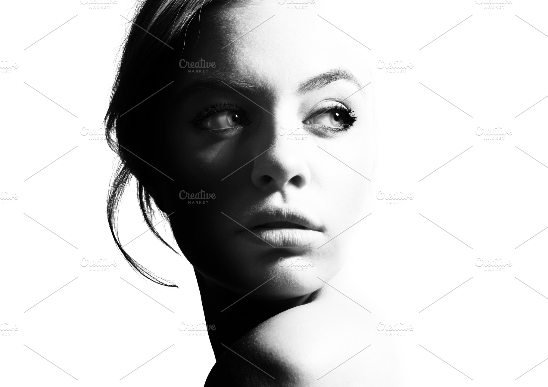 High contrast black and white portrait of a beautiful girl featuring profile, a Beauty & Fashion Photo by sport&beauty stock photo