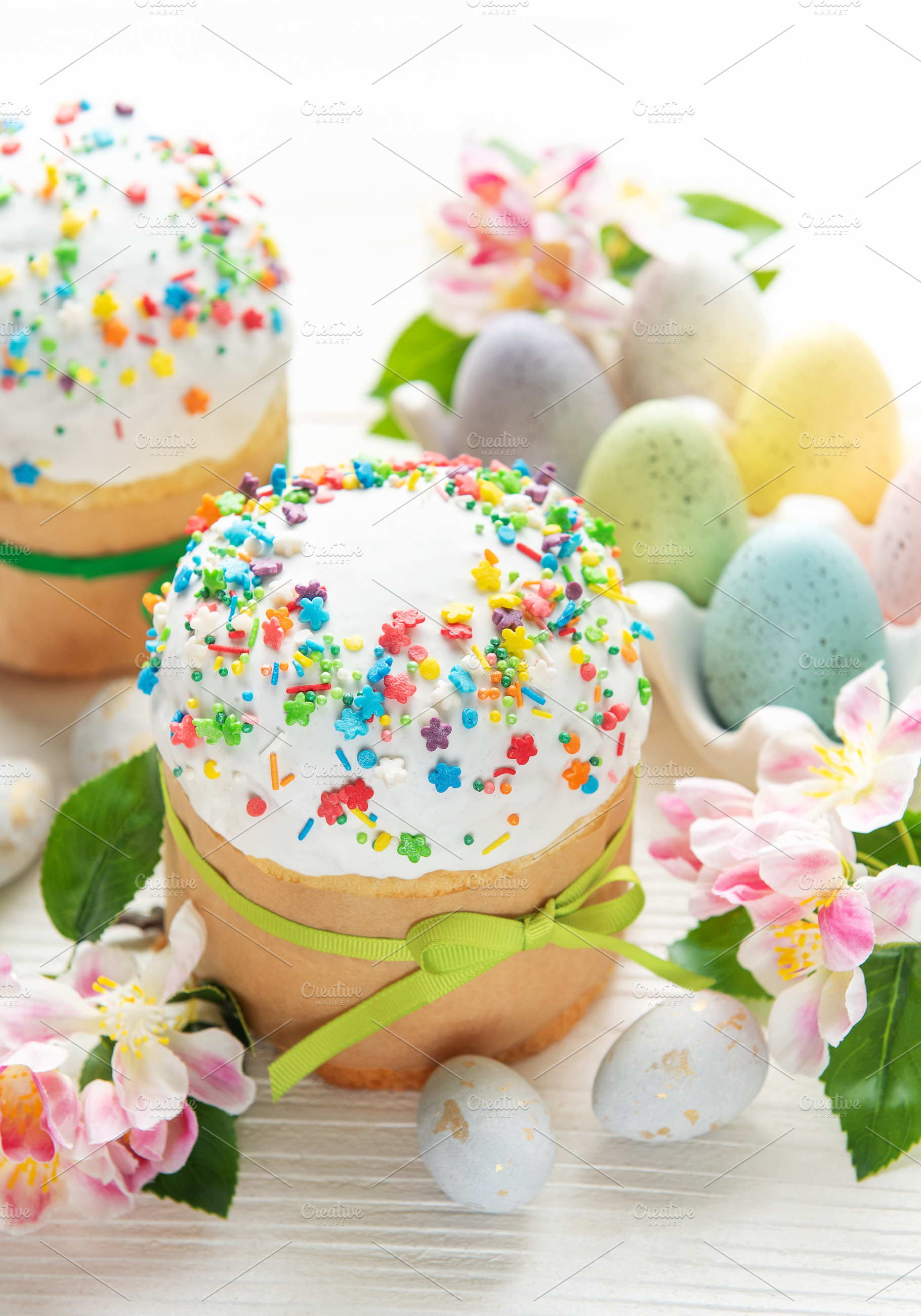 Delicious easter cakes decorated with colorful sprinkles and egg, a Holiday Photo by Olena Rudo