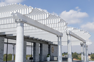 Detail of A Beautiful Marble and Wood Pergola Patio Cover., a Photo by Andy Dean Photography
