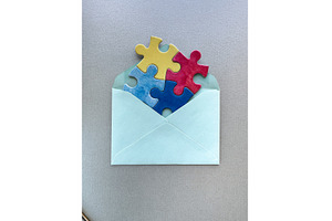 Colorful puzzle pieces emerging from, a Photo by tilialucida