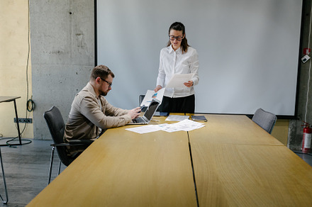 Two office workers in office