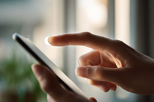 Using a smartphone in a bright room, a Photo by Beautiful things