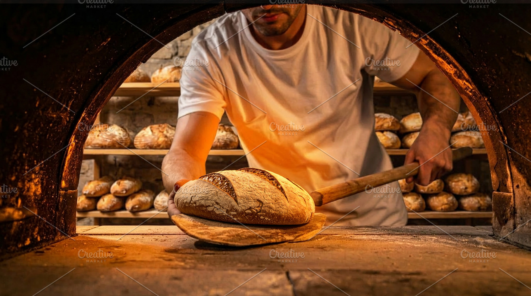 Artisan Baker Removing Fresh Bread from Oven, a Food & Drink Photo by Davizro's Market
