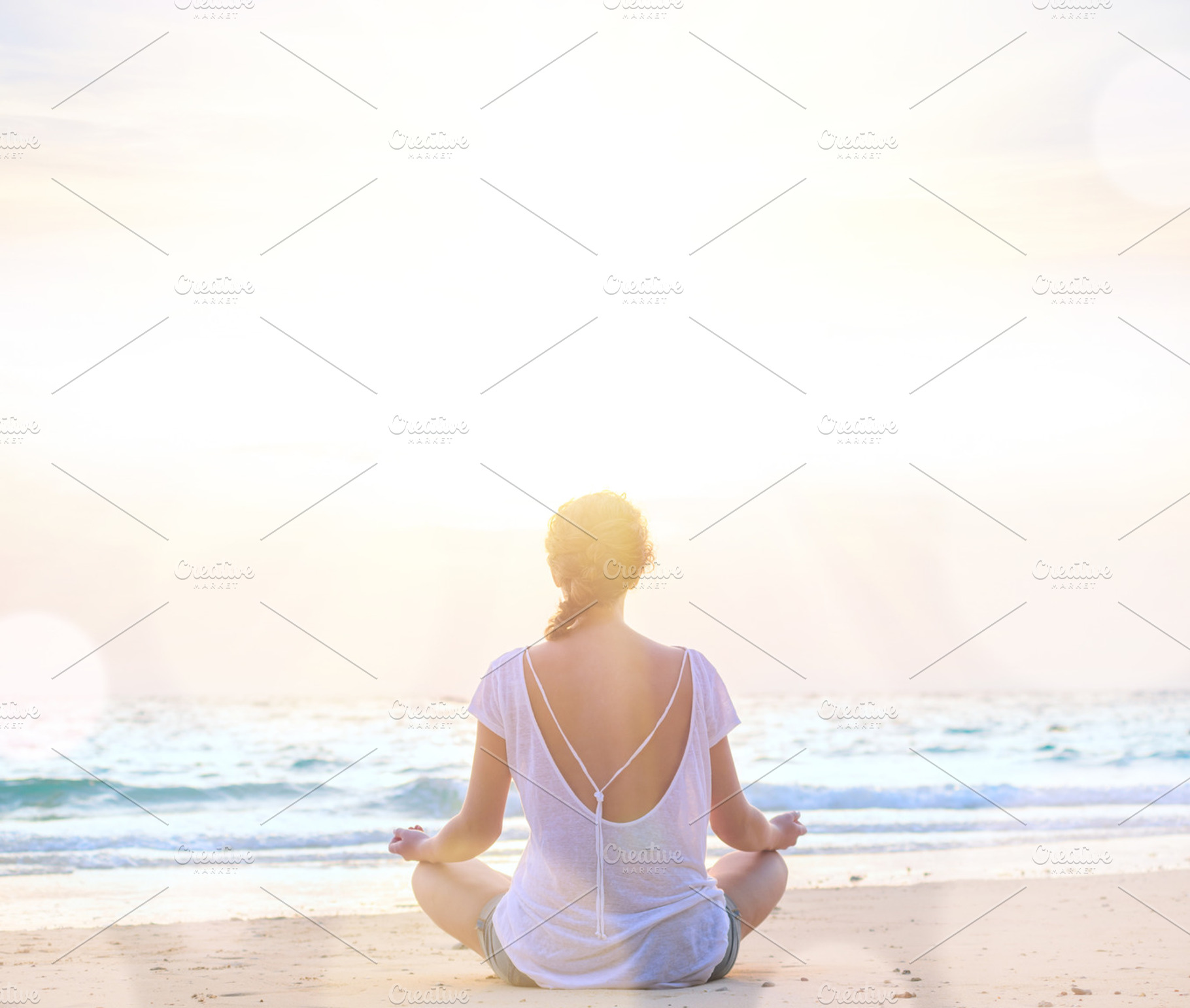 Woman practice yoga at sunrise beach containing woman, summer, and beach, a Person Photo by sergeypeterman
