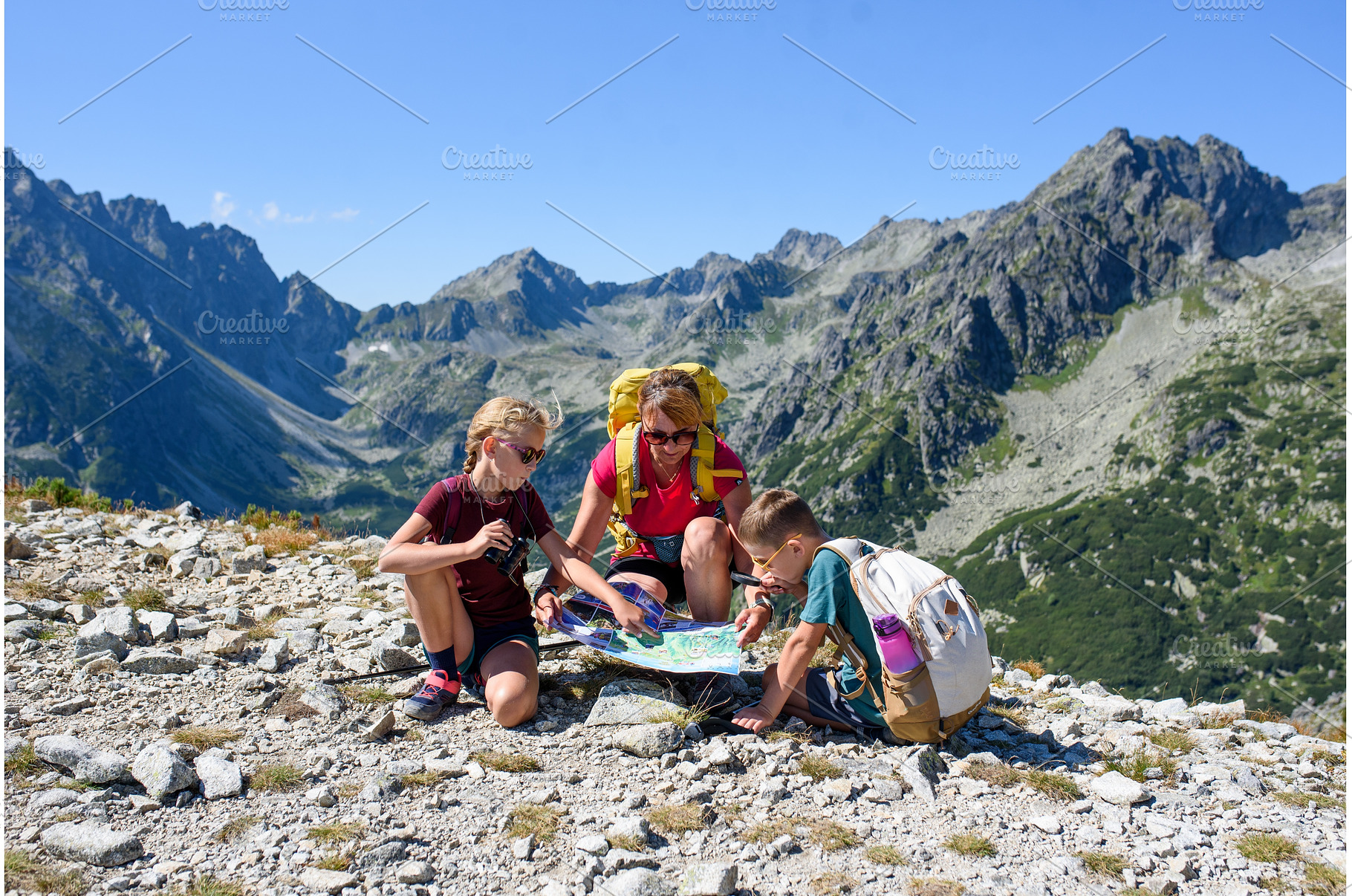 Grandmother looking for route in map, a Nature Photo by HalfPoint