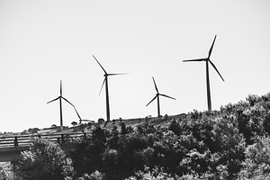 Wind turbines on hill in black white, an Industrial Photo by SkyNext