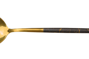 Golden metal spoon with dark patterned handle on isolated backgr, a Food & Drink Photo by ndanko