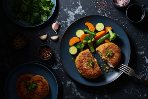 Chicken Kyiv cutlet served with stea, a Food & Drink Photo by professorinc