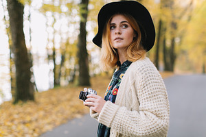 Hippie girl with old camera featuring autumn, girl, and park