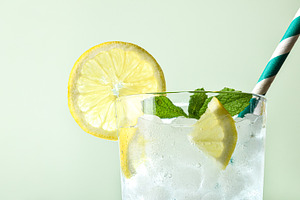 Very cold lemon soda drink with ice cubes isolated background, a Food & Drink Photo by Davizro's Market